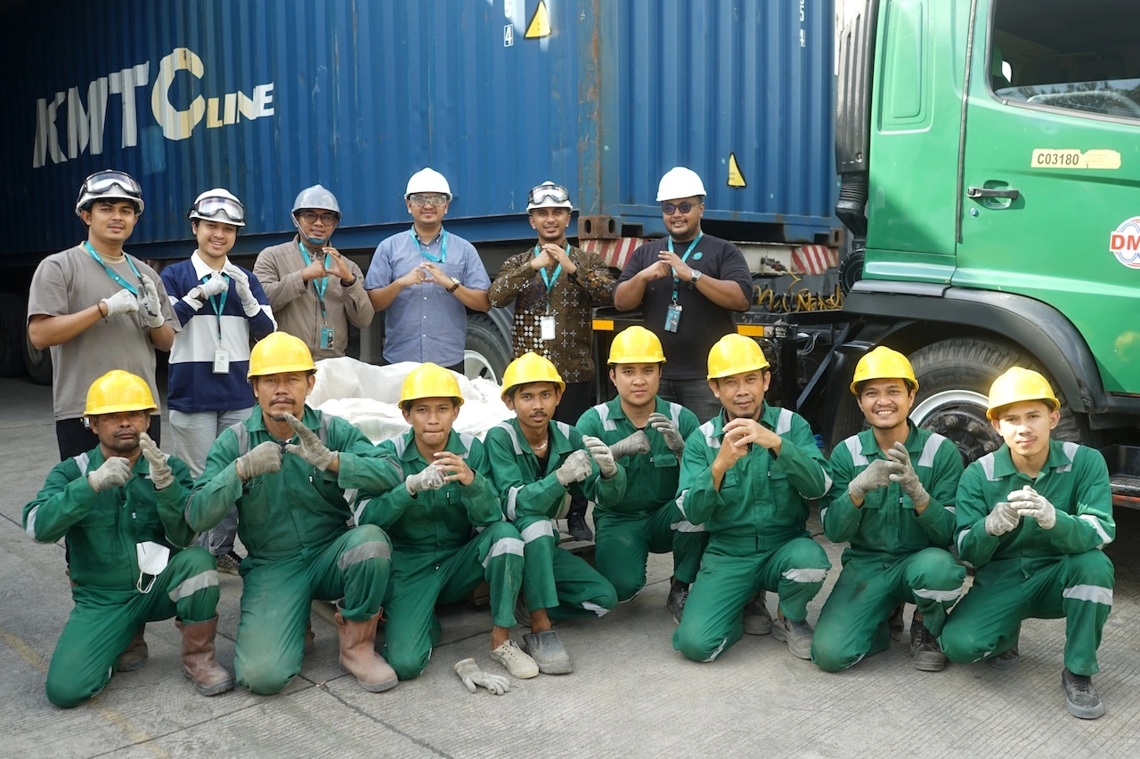 Recycling worker back view